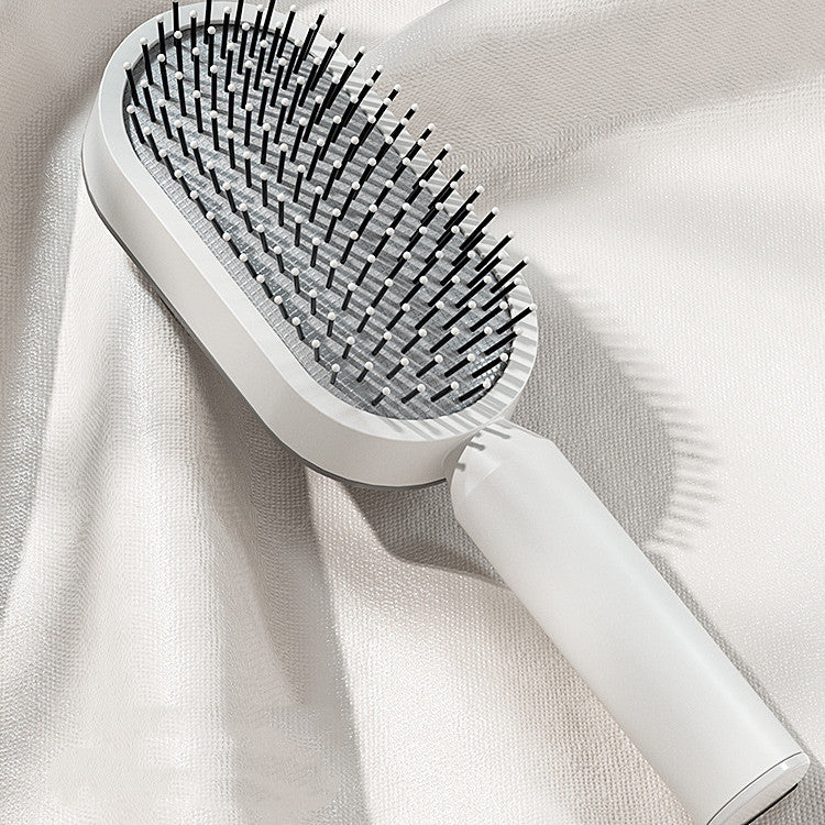 Nexova™ Self-Cleaning Hair Brush - One-Click Hair Removal