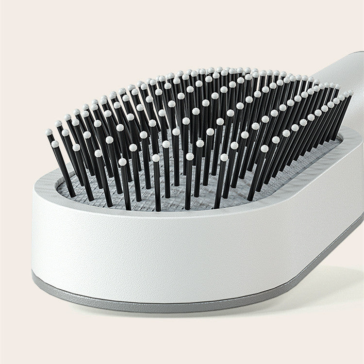 Nexova™ Self-Cleaning Hair Brush - One-Click Hair Removal